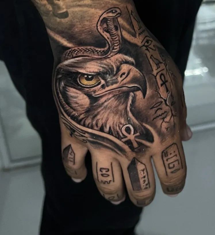 Black and grey eagle hand tattoo by Kangaroo Ink Patong