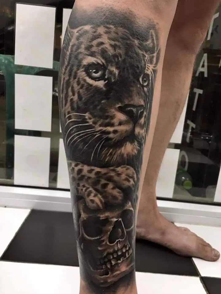 Black and grey leopard and skull tattoo by Kangaroo Ink Patong