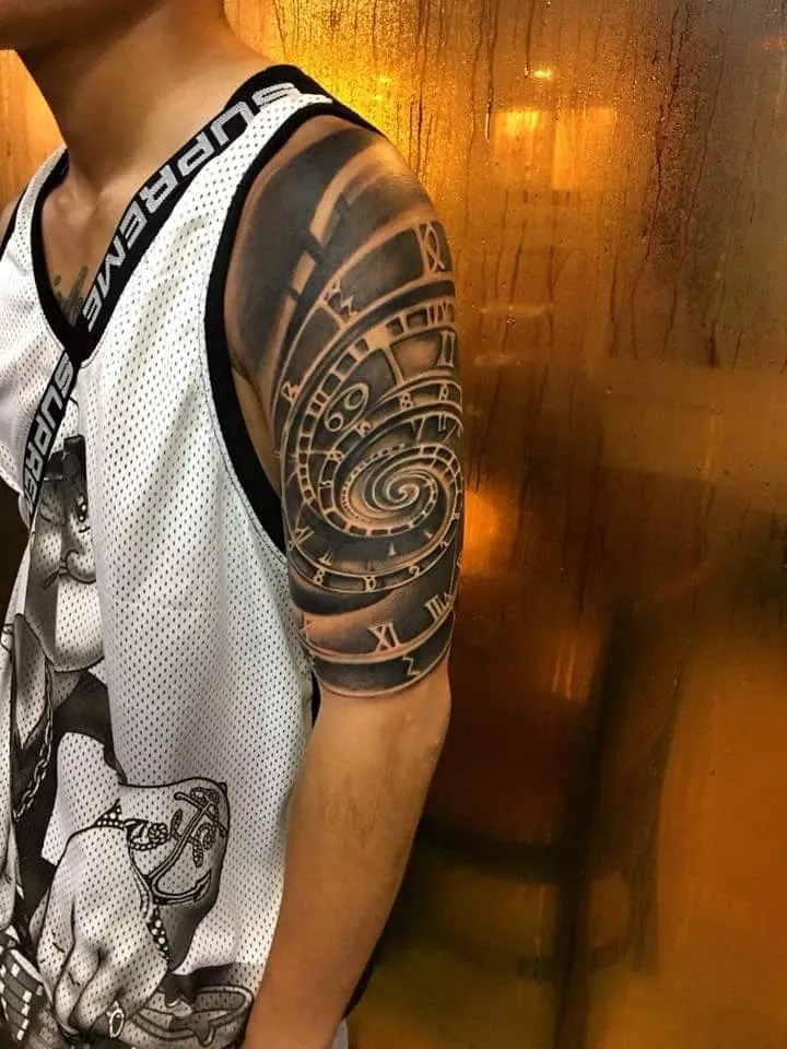 Geometric blackwork shoulder tattoo by Kangaroo Ink Patong